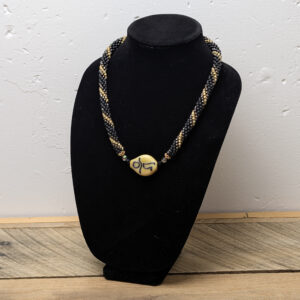 Black and Gold Necklace with Cave Painting Figure